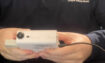 closeup of sensoscientific employee's hands working on a device